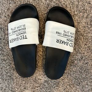 Ted Baker. 38. Slides gently used.